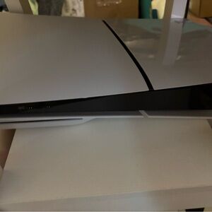 Sleek White and Black Gaming Console